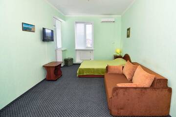 Фото номера Улучшенный четырехместный номер Гостиница Guest House Europa г. Коктебель 3