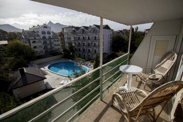 Фото номера Двухкомнатный номер  Гостиница Camelia Kafa Hotel г. Коктебель 4